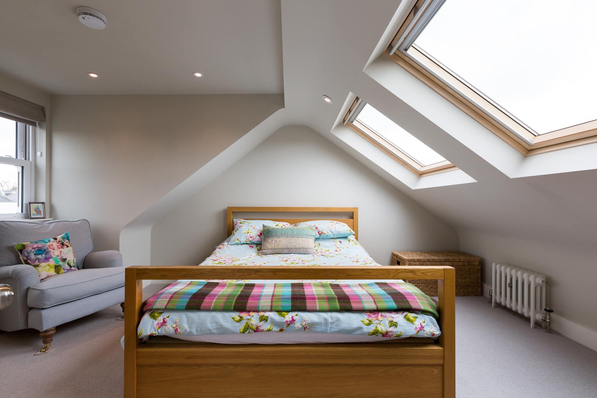 Period Edwardian terrace house roof lines showing hipped configurations and vertical brick masonry extension potentials