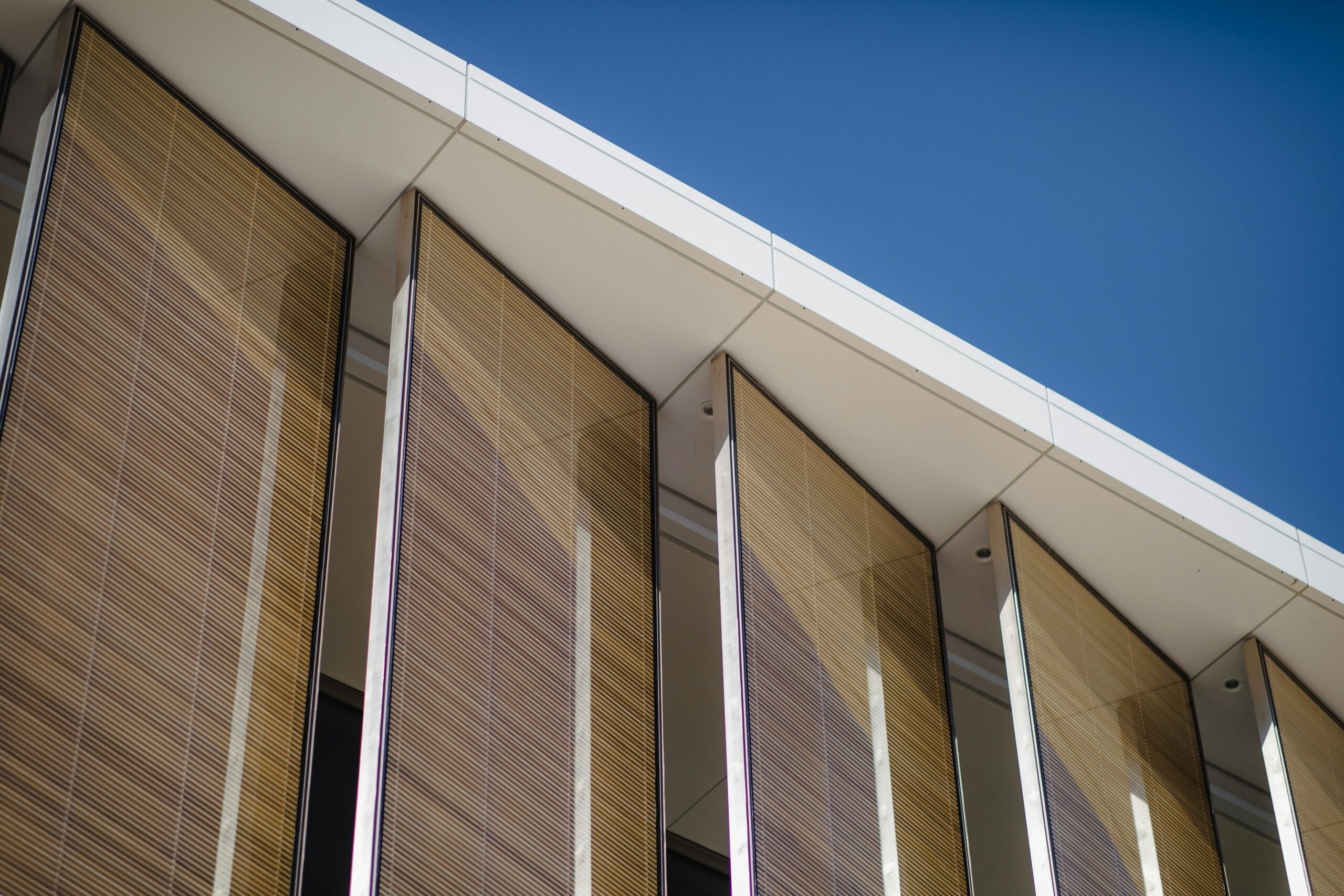 Bespoke timber cladding and shingle extensions engineered by Design and build contractor London